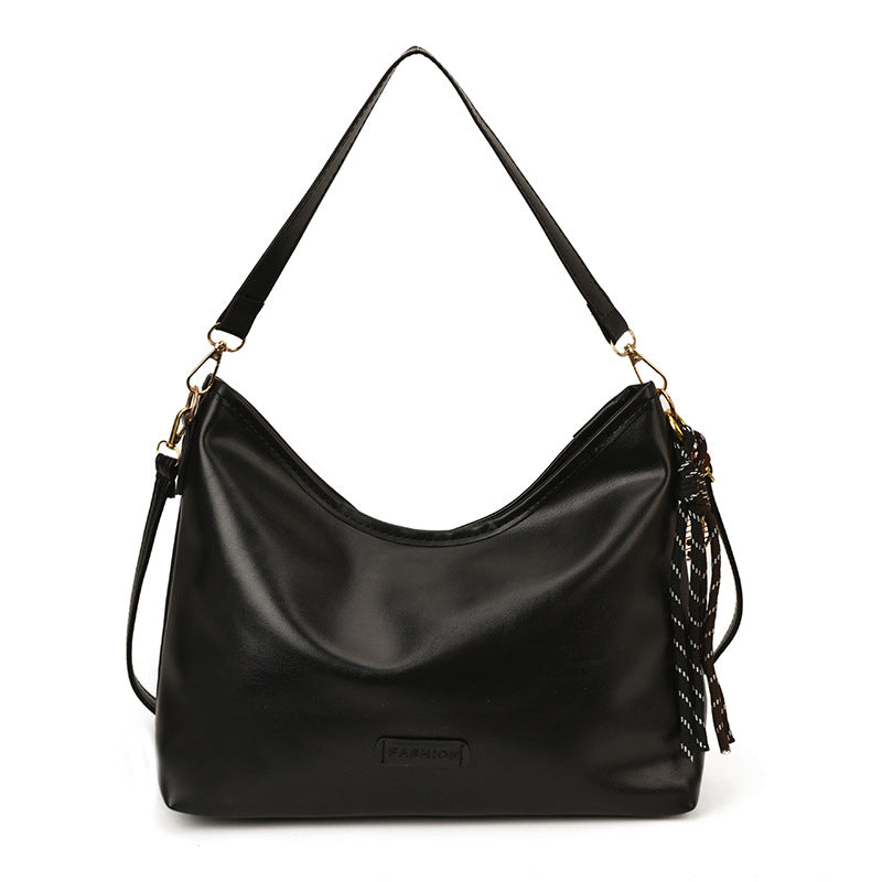 Damen Hobo-Tasche mit elegantem Design und dekorativem Quastenanhänger Nord Taschen