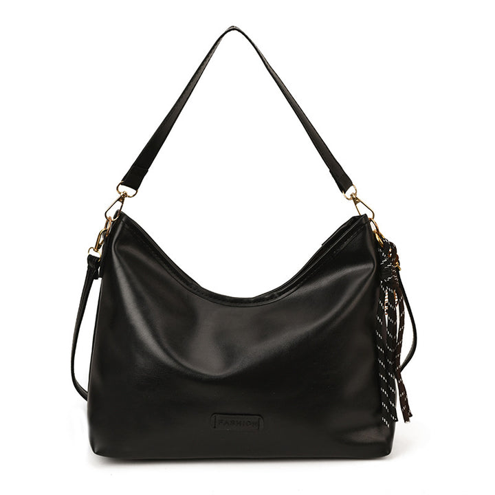 Damen Hobo-Tasche mit elegantem Design und dekorativem Quastenanhänger Nord Taschen