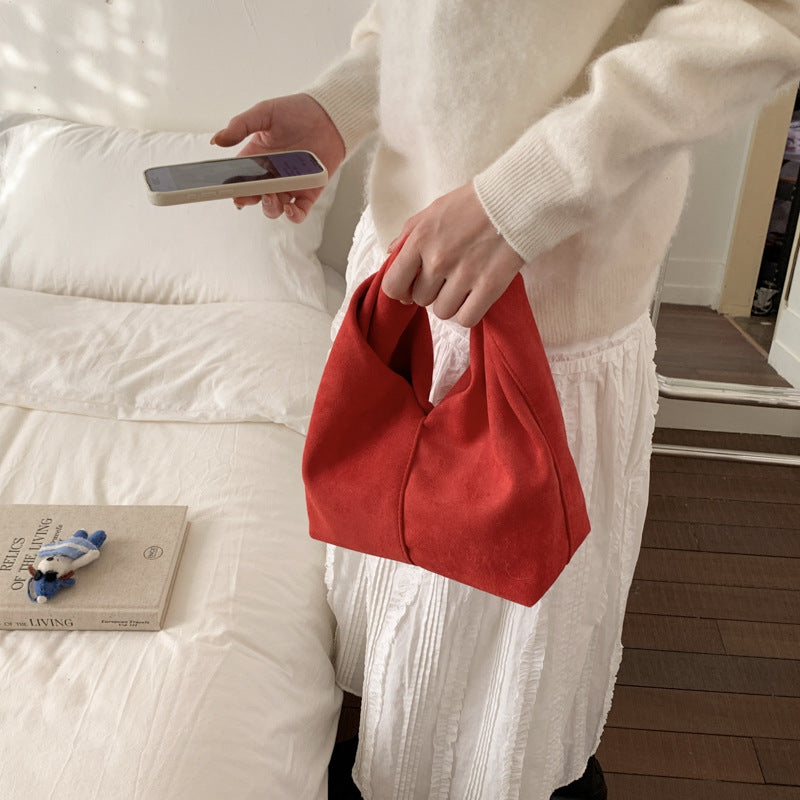 Damen Schultertasche aus weichem Veloursleder mit modernem Knotenakzent Nord Taschen