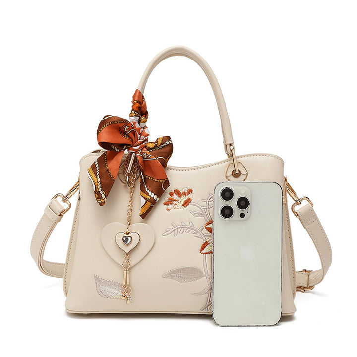 Damen elegante Handtasche mit floralem Stickdesign und modischem Schal Nord Taschen