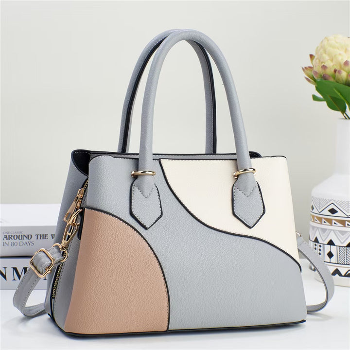 Damen Handtasche mit kreativem Farbdesign und verstellbarem Schulterriemen Nord Taschen