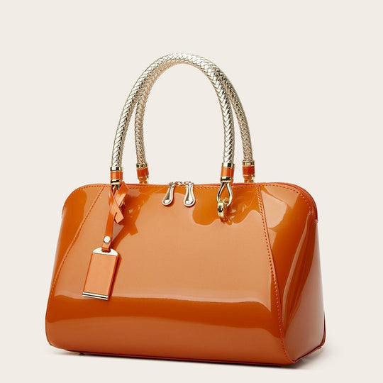 Damen Handtasche mit eleganter Lackoberfläche und geflochtenen Griffen Nord Taschen