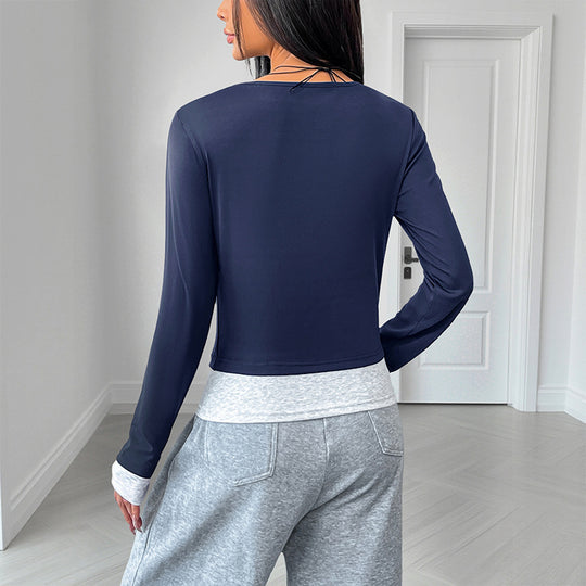 Damen Tailliertes Langarm-Crop-Top mit Henley-Knopfleiste und Daumenlochbündchen Nord Taschen