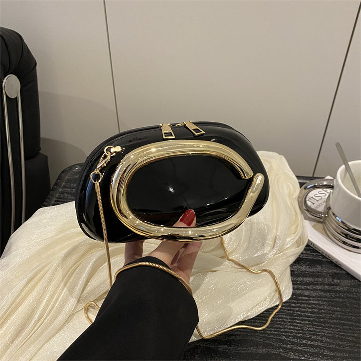 Damen Handtasche mit innovativem Kettenverschluss und funkelndem Design Nord Taschen