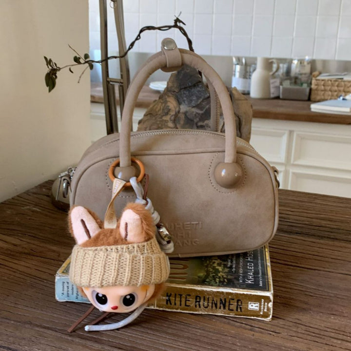 Damen Mini-Handtasche mit verspieltem Tieranhänger Nord Taschen