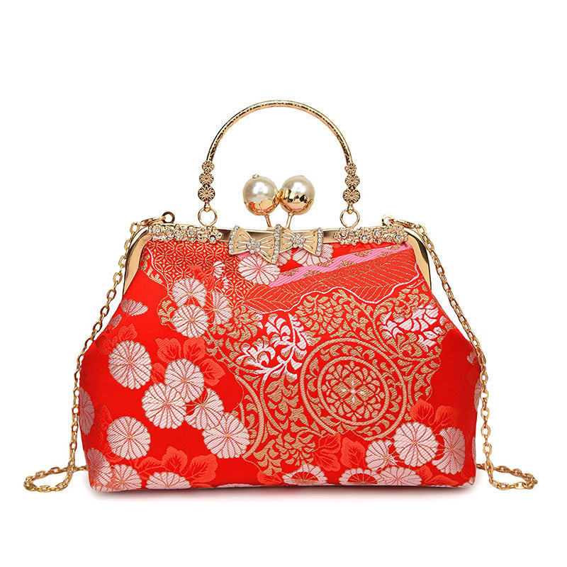 Damen elegante Umhängetasche mit floralem Design und Kunstlederakzenten Nord Taschen