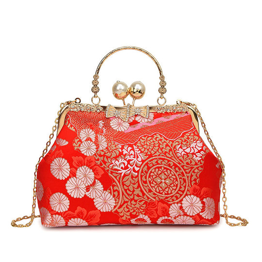 Damen elegante Umhängetasche mit floralem Design und Kunstlederakzenten Nord Taschen