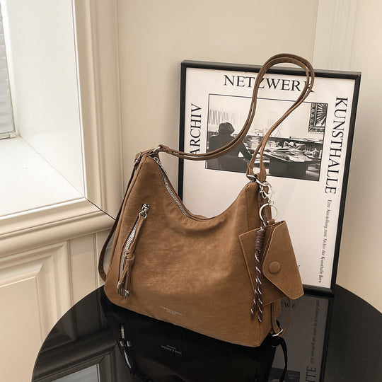 Damen Hobo-Tasche aus hochwertigem Wildleder mit modischen Akzenten Nord Taschen