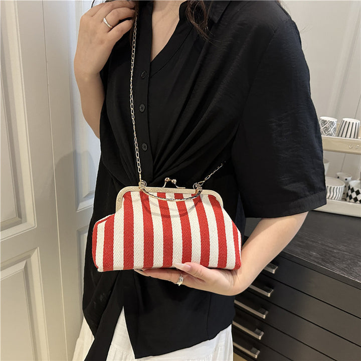 Damen Handtasche mit gestreiftem Design und goldenen Akzenten Nord Taschen