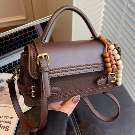 Damen elegante Umhängetasche mit kunstvoll geflochtenen Details Nord Taschen