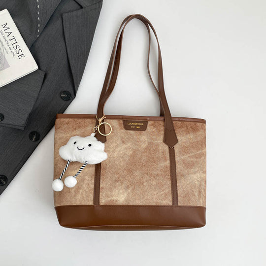 Damen elegante Tragetasche mit verspieltem Anhänger Nord Taschen