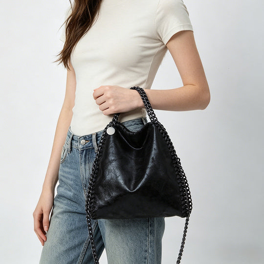 Damen Hobo-Tasche mit eleganter Kettenverzierung und weicher Veloursoberfläche Nord Taschen