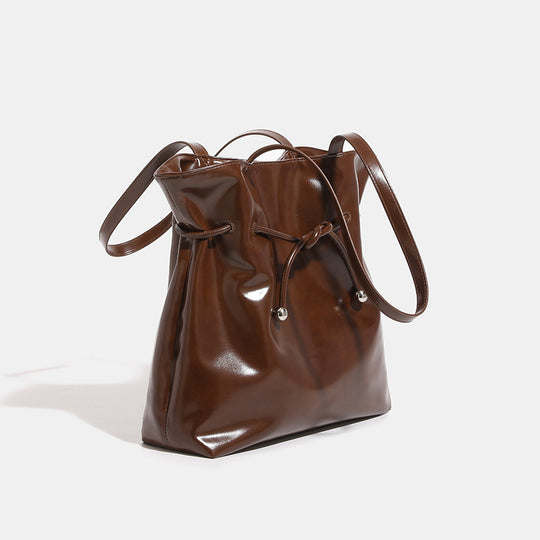 Damen elegante Beuteltasche mit verspieltem Kordelzug Nord Taschen