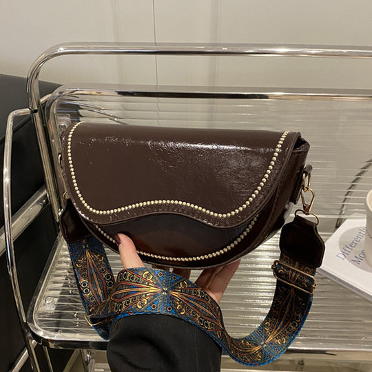 Damen Umhängetasche mit verzierten Kettendetails und dekorativem Schulterriemen Nord Taschen