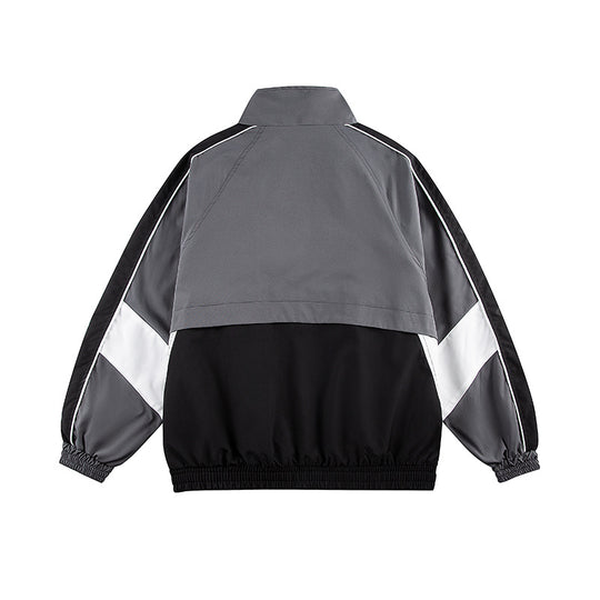 Unisex Kastig geschnittene Trackjacke im Retro-Sportstil mit hohem Stehkragen, Farbblock‑Einsätzen und elastischem Saum Nord Taschen