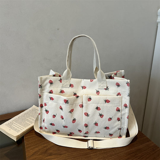 Damen Umhängetasche mit fröhlichem Erdbeerprint und praktischen Fächern Nord Taschen