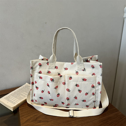 Damen Umhängetasche mit fröhlichem Erdbeerprint und praktischen Fächern Nord Taschen