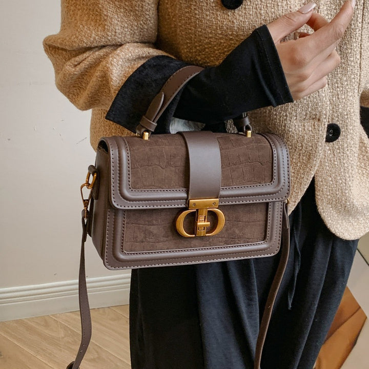 Damen elegante Handtasche mit Krokodilprägung und goldenen Akzenten Nord Taschen