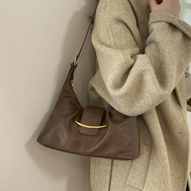 Damen Hobo-Tasche aus geschmeidigem Leder mit dekorativem Verschluss Nord Taschen