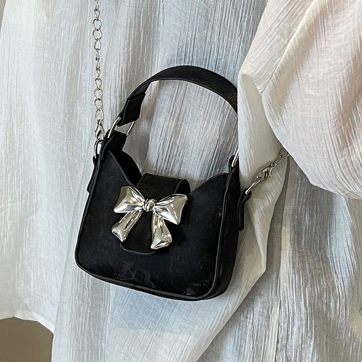 Damen Handtasche mit glänzendem Schleifenverschluss Nord Taschen