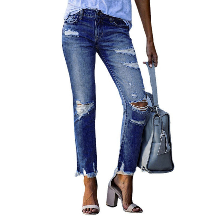 Damen destroyed Jeans mit fransigen Säumen und modischen Rissen