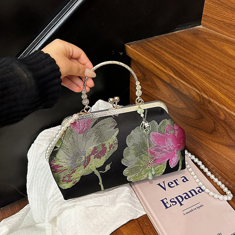 Damen stilvolle Handtasche mit floralen Mustern und Perlenkette Nord Taschen