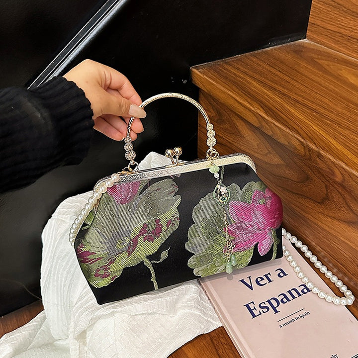 Damen stilvolle Handtasche mit floralen Mustern und Perlenkette Nord Taschen