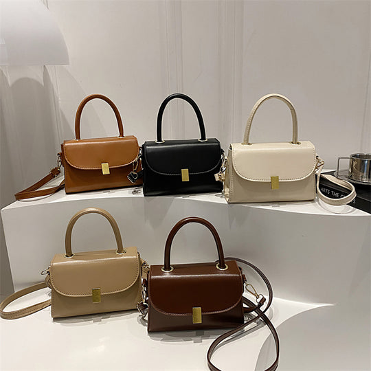 Damen-Handtasche mit abnehmbarem Schulterriemen und eleganter Verschlussmechanik Nord Taschen