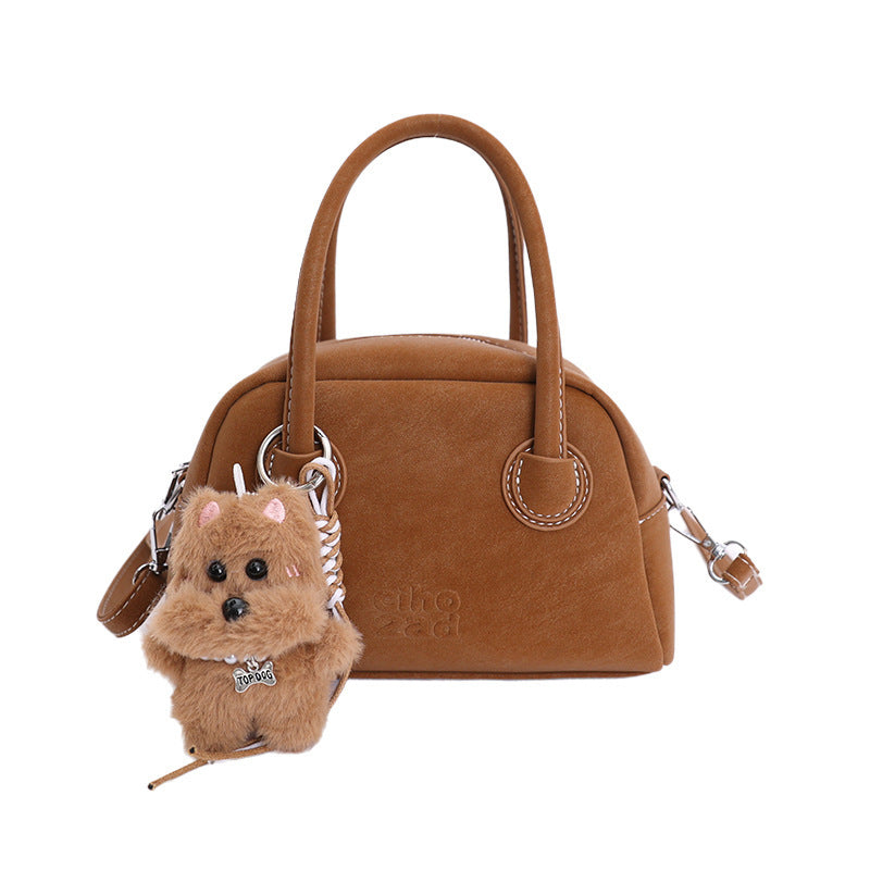 Damen-Handtasche mit verspieltem Tieranhänger Nord Taschen