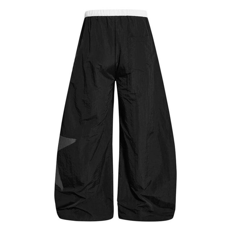 Damen Weite Palazzo-Hose mit Tunnelzugbund und großflächigem Statement-Print Nord Taschen