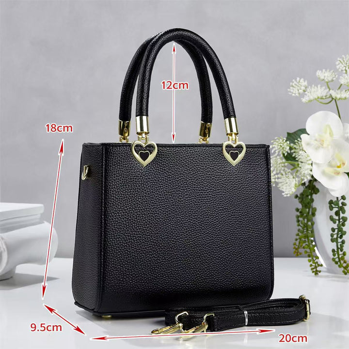 Damen stylische Handtasche mit schimmernden Herzanhängern Nord Taschen