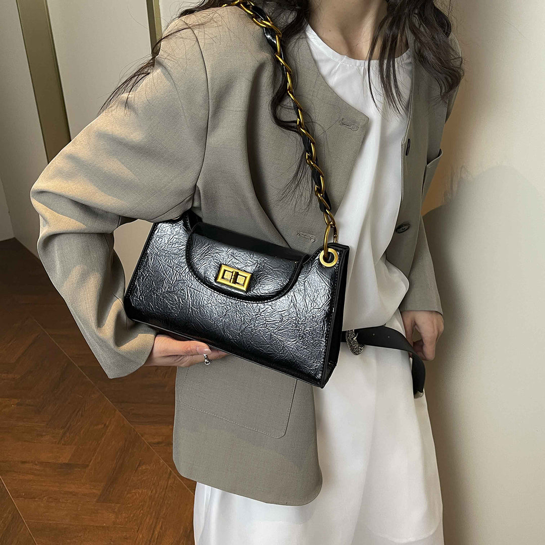 Damen elegante Handtasche mit dekorativem Kettenhenkel Nord Taschen