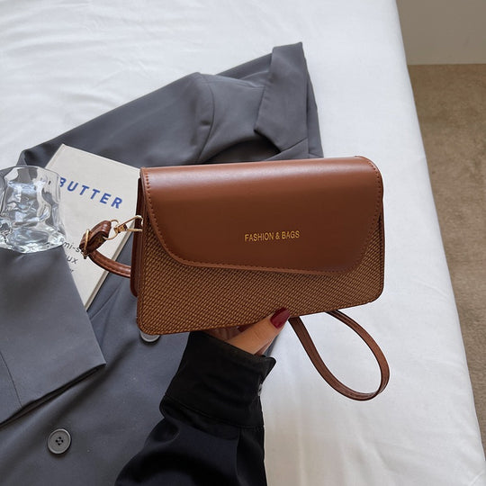 Damen Umhängetasche im stilvollen Kombi-Design mit hochwertigem Leder und gewebtem Stoff Nord Taschen