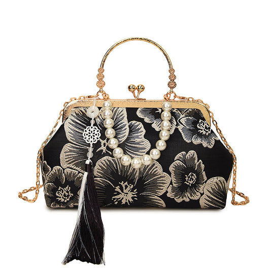 Damen elegante Abendtasche mit floralem Design und attraktiver Kettenakzent Nord Taschen