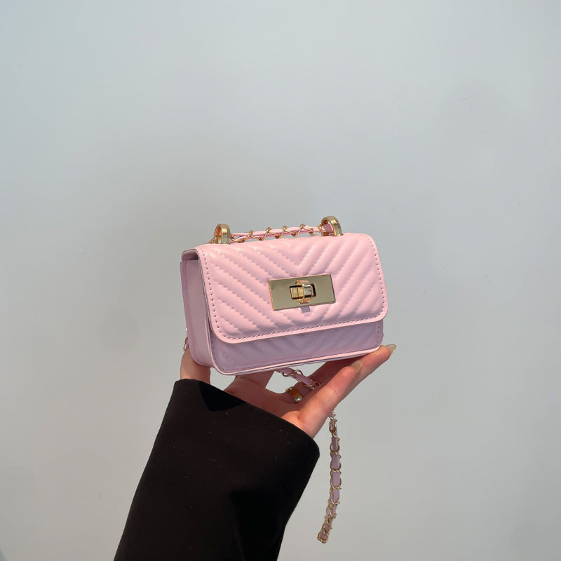 Damen Mini-Handtasche mit gestepptem Design und goldenem Verschluss Nord Taschen
