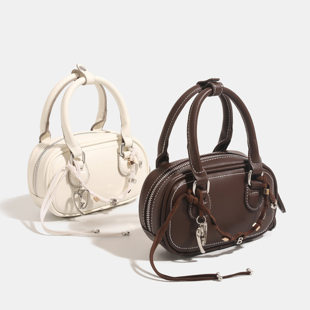 Damen Mini-Handtasche mit verspieltem Kordelzug und eleganten Akzenten Nord Taschen
