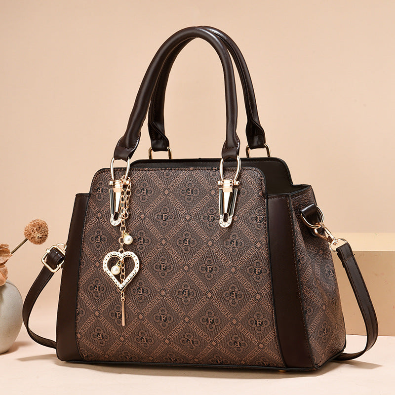 Damen Handtasche mit luxuriösem Mustermix und abnehmbarem Anhänger Nord Taschen