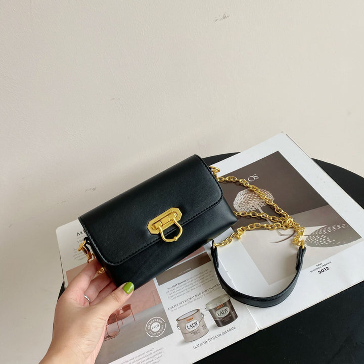 Damen Umhängetasche mit elegantem Kettenriemen und klappbarem Verschluss Nord Taschen