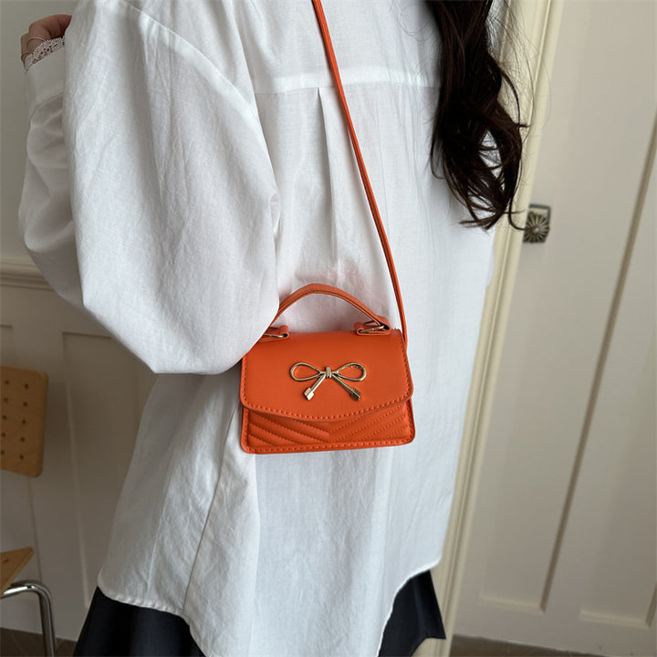 Damen Mini-Handtasche mit eleganter Schleifenverzierung Nord Taschen