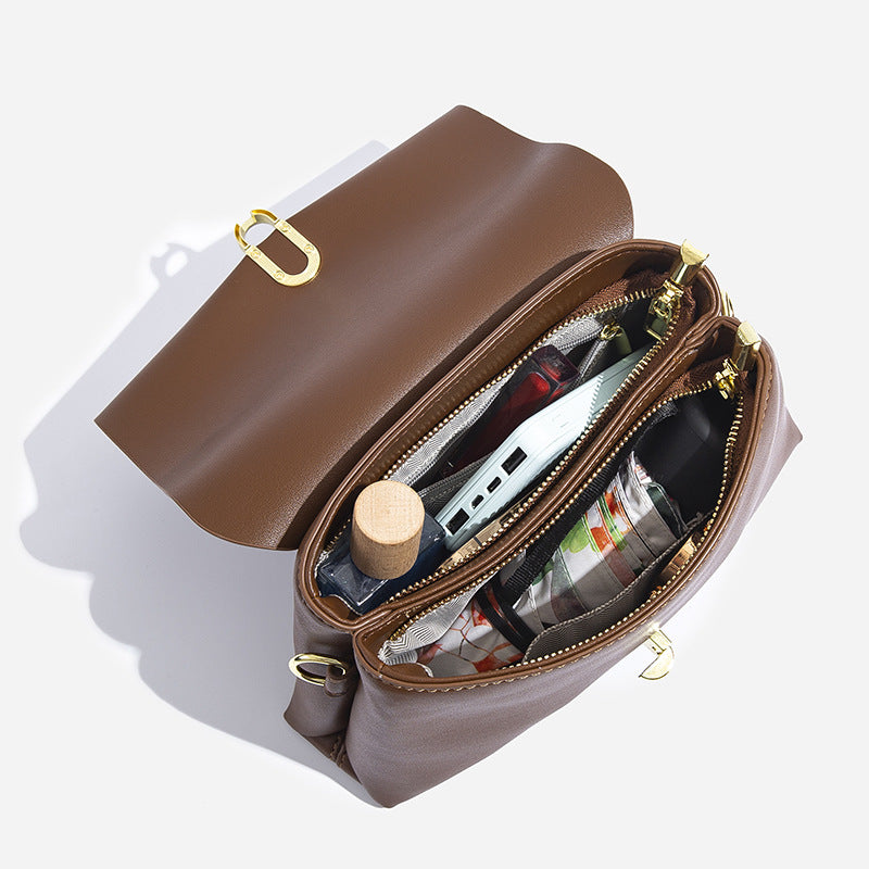 Damen Handtasche mit abnehmbarem Schulterriemen und eleganten Details Nord Taschen