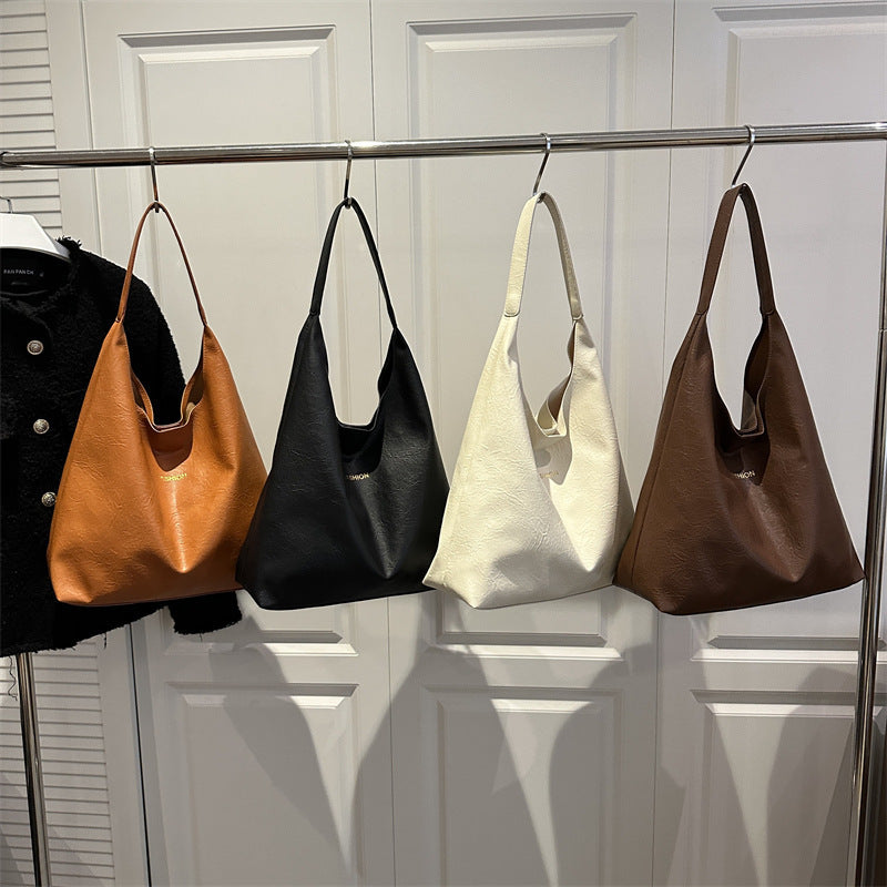 Damen elegante Umhängetasche aus kunstleder mit einer passenden Kosmetiktasche Nord Taschen