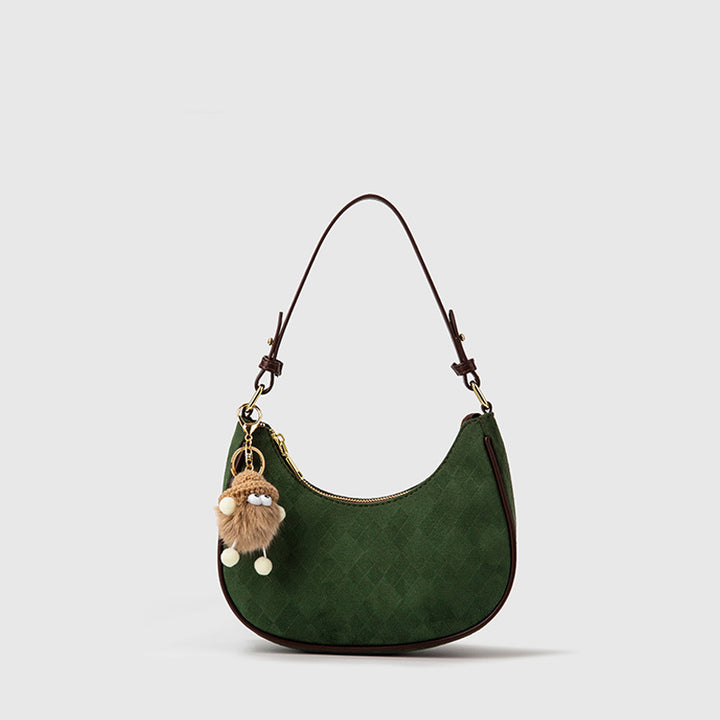 Damen Handtasche aus hochwertigem Wildleder mit verspieltem Anhänger | Nord Taschen