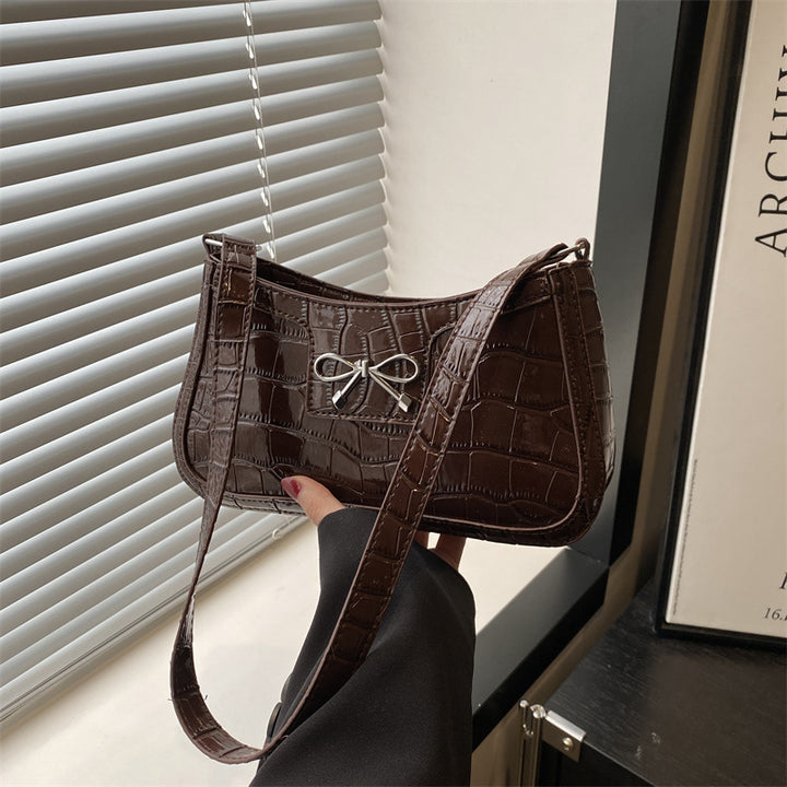 Damen elegante Handtasche mit Krokodilprägung und Schleifendetail Nord Taschen