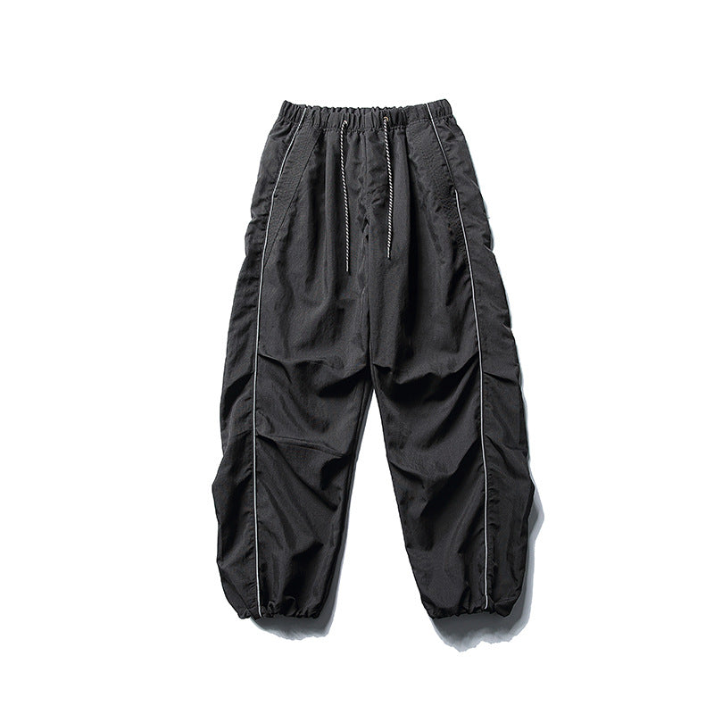 [Herren] weit geschnittene Nylon-Joggerhose im Utility-Stil mit Tunnelzugbund, Kontrastpaspel und elastischen Knöchelabschlüssen Nord Taschen