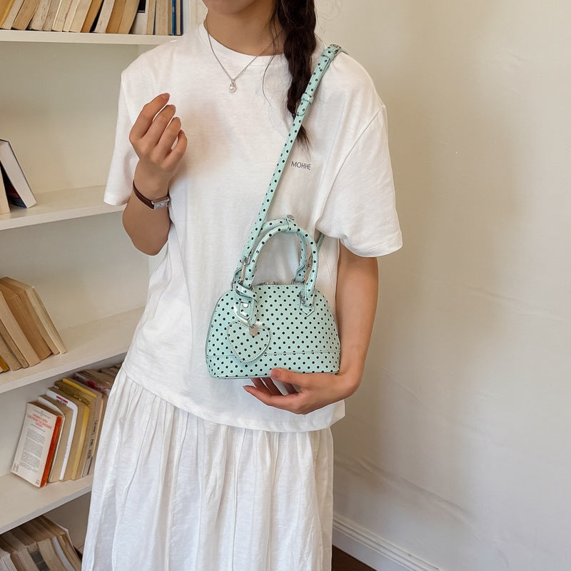 Damen Mini-Handtasche mit verspieltem Punktemuster und abnehmbarem Tragegurt Nord Taschen
