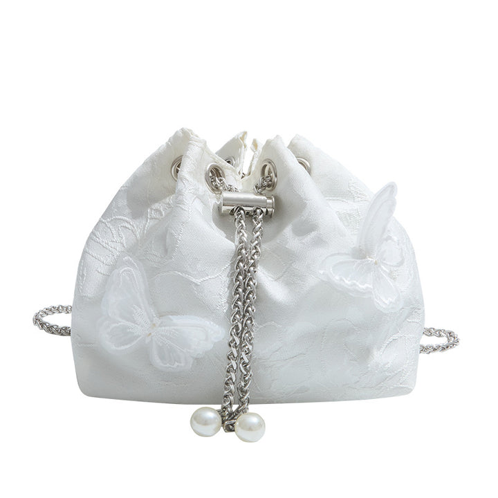 Damen Beuteltasche mit verspieltem Schmetterlingsdesign und eleganten Kettenakzenten Nord Taschen