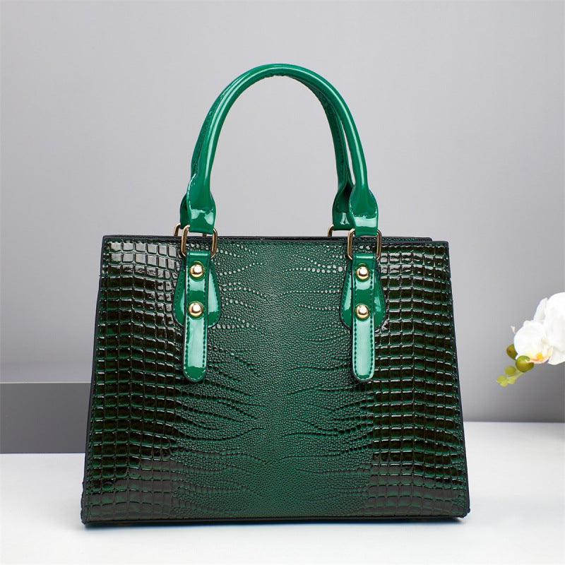 Damen elegante Handtasche mit schicker Schleifenapplikation und edlem Krokodil-Look Nord Taschen