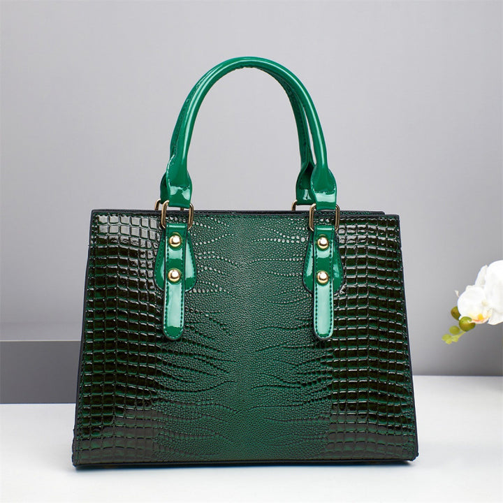 Damen elegante Handtasche mit schicker Schleifenapplikation und edlem Krokodil-Look Nord Taschen