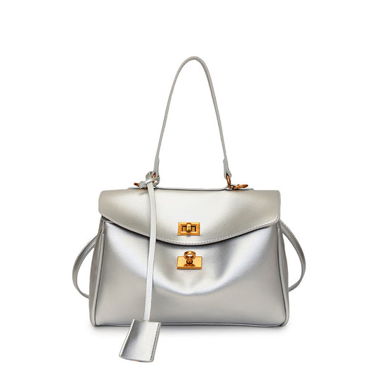 Damen modische Handtasche mit eleganter Struktur und goldenen Verzierungen | Nord Taschen