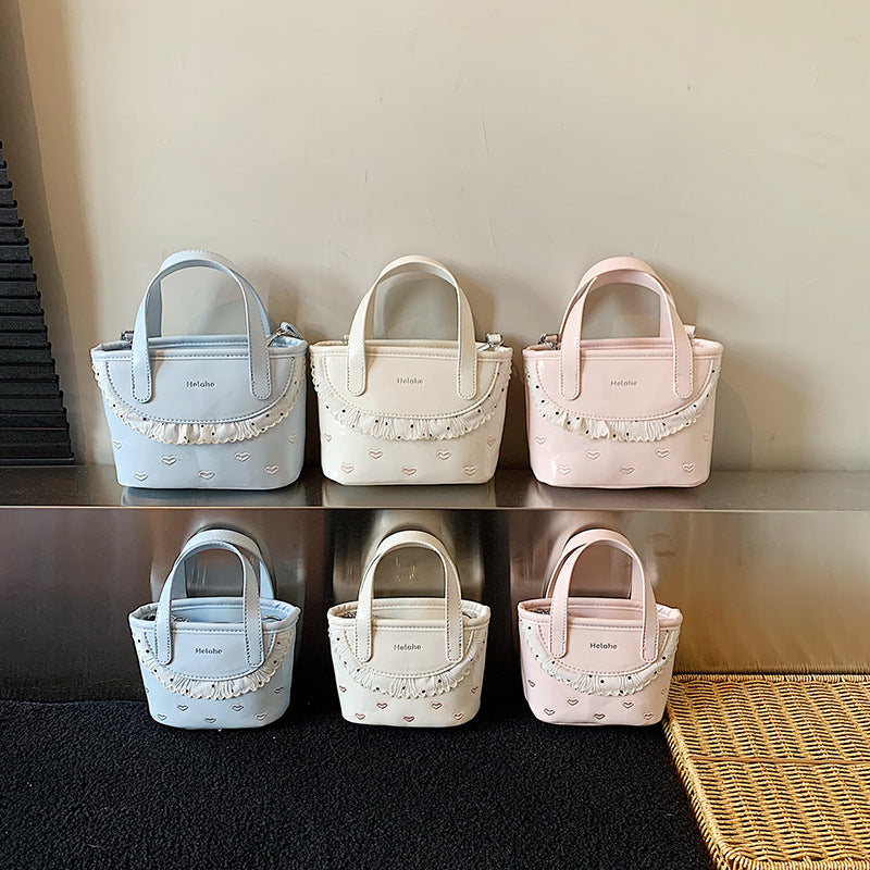 Damen modische Handtasche mit verspieltem Rüschendesign Nord Taschen